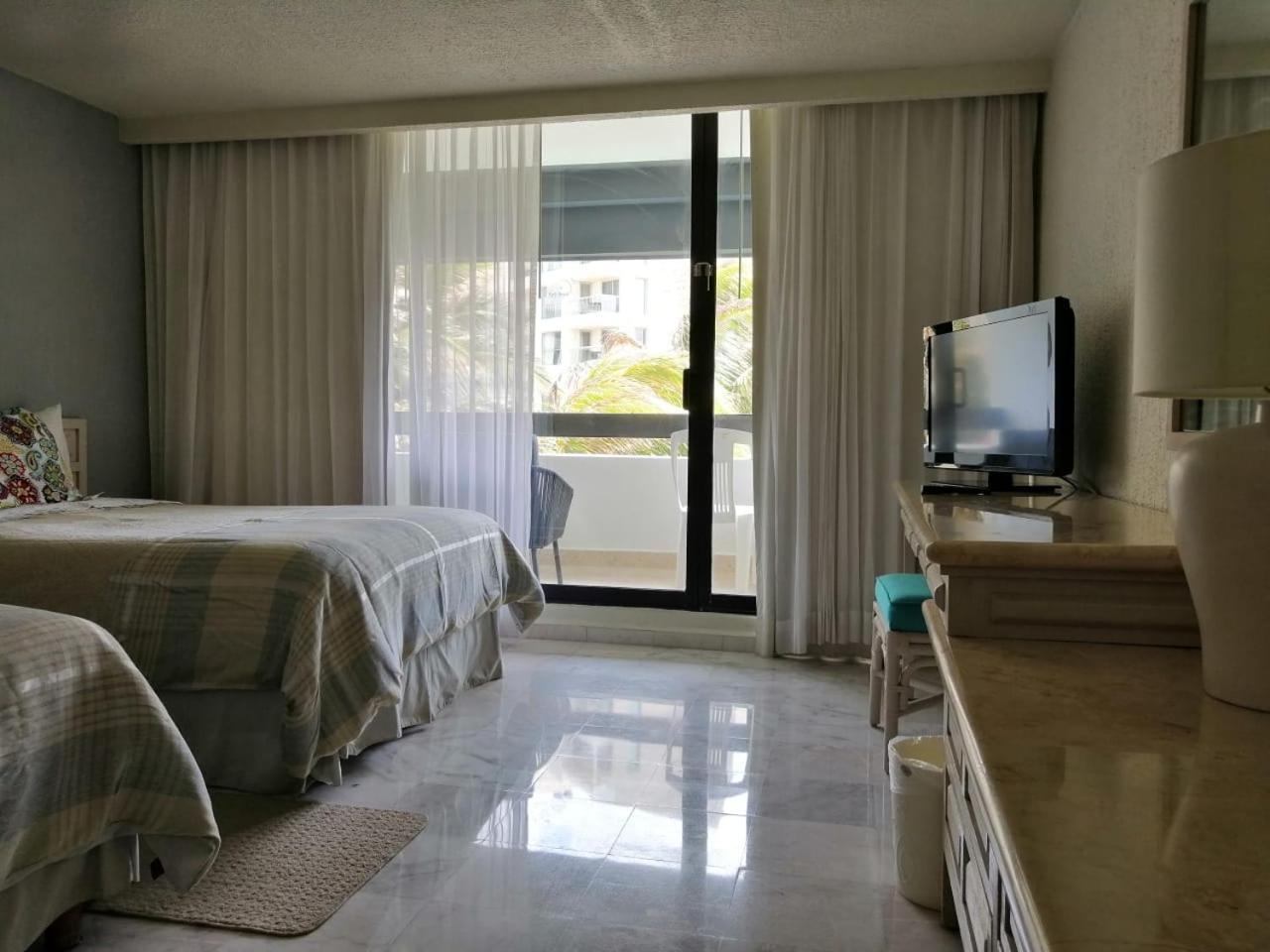 Beachfront Getaway Condo Cancún Rom bilde